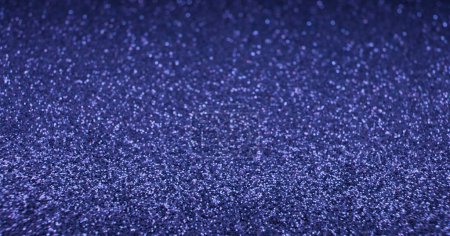 Photo for Glitter abstract background. Blur sparkles texture. Sequin radiance. Defocused blue color shimmering circles glow on dark free space wallpaper. - Royalty Free Image