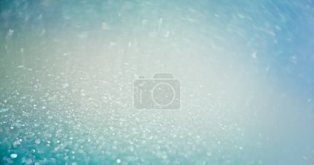 Photo for Light flare overlay. Bokeh glow. Glamour sequin gleam. Defocused blue color shimmering sparkles reflection abstract empty space background. - Royalty Free Image
