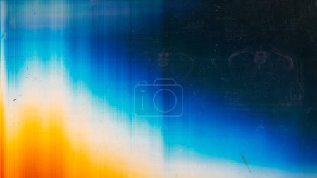 Foto de Dust scratch overlay. Light flare. Old film texture. Orange blue white rainbow color glow defect dirt stains on dark abstract empty space background. - Imagen libre de derechos