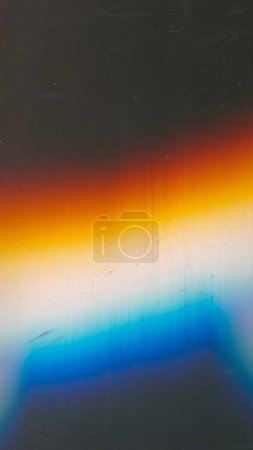 Photo for Dust scratches overlay. Light flare noise. Distressed texture. Orange blue white color glow defect dirt stains on dark black abstract copy space background. - Royalty Free Image