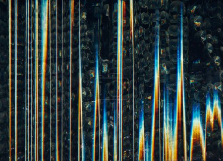 Foto de Glitch noise texture. Light flare. Digital distortion. Orange blue white rainbow color fuzzy vibration waves artifacts on dark black abstract background. - Imagen libre de derechos