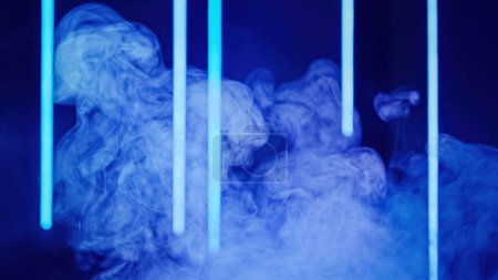 Photo for Neon smoke. Blur color light. Vapor cloud. Defocused blue luminous glow steam floating on dark abstract free space futuristic background. - Royalty Free Image