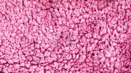 Foto de Fur texture. Abstract background. Fluffy plush. Pink color fuzzy cotton ornament material uneven structure creative illustration wallpaper. - Imagen libre de derechos