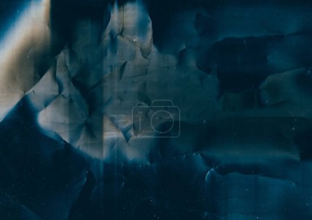 Photo for Grunge overlay. Weathered film. Crumpled foil texture. Blue orange stains dust scratch noise on dark wrinkled aged abstract illustration background. - Royalty Free Image