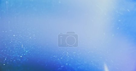 Foto de Blur glow overlay. Light flare. Bokeh radiance. Defocused blue white color shiny glitter rays gleam abstract copy space background. - Imagen libre de derechos