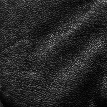 Téléchargez les photos : Creased leather. Embossed texture. Textile material. Black skin grain structure dark uneven grunge abstract illustration free space background. - en image libre de droit