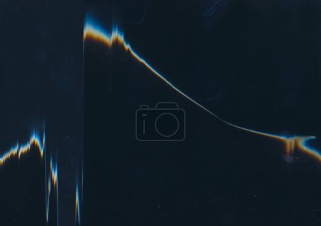 Photo for Distressed film. Glitch noise. Worn texture. Blue orange rainbow color light flare defect dust scratches on dark black abstract illustration copy space background. - Royalty Free Image