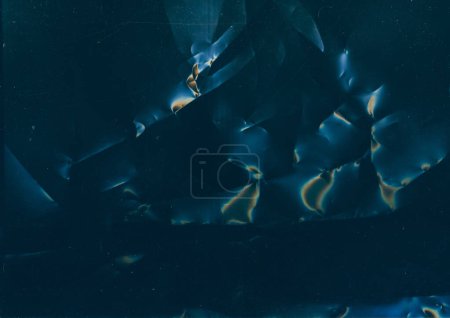 Foto de Textura grunge. Película angustiada. Superficie usada Color naranja azul llamarada polvo arañazos ruido en oscuro aplastado fondo ilustración abstracta. - Imagen libre de derechos