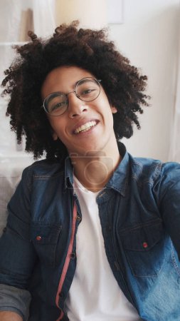 Photo for Blogger face happy selfie. Positive lifestyle. Portrait of satisfied cheerful attractive smiling guy with curly hair taking picture alone. - Royalty Free Image