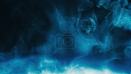 Photo for Glitter mist. Color cloud. Night sky. Blue shiny sparkling particles smoke floating on dark black abstract art background with copy space. - Royalty Free Image