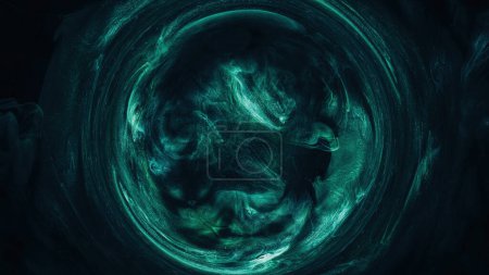 Photo for Mist circle. Round frame. Mystic vortex. Green blue color glowing sparkling glitter particles in smoke swirl on dark black abstract background. - Royalty Free Image
