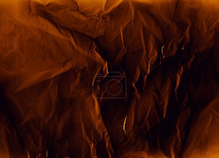 Photo for Wrinkled texture. Distressed paper. Aged overlay. Creased noise on dark orange black crumpled uneven structure illustration abstract background. - Royalty Free Image