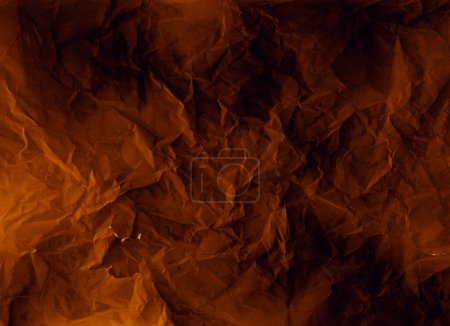 Photo for Crumpled paper. Worn texture. Weathered overlay. Crinkled noise on dark orange black rough grunge structure illustration abstract background. - Royalty Free Image