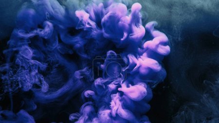 Photo for Fluid splash. Color vapor. Ink water shot. Pink blue glowing explosion smoke cloud on dark black abstract art background with free space. - Royalty Free Image