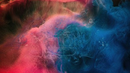 Photo for Paint water. Color mist. Magic spell mystery. Blue pink contrast vapor floating splash cloud blend on dark black abstract art background. - Royalty Free Image