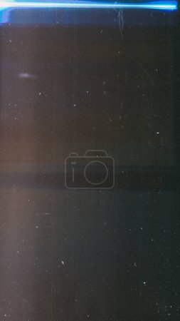 Photo for Old film overlay. Dust scratches noise. Weathered texture. Blue color light flare dirt stains on dark brown black distressed surface illustration abstract background. - Royalty Free Image