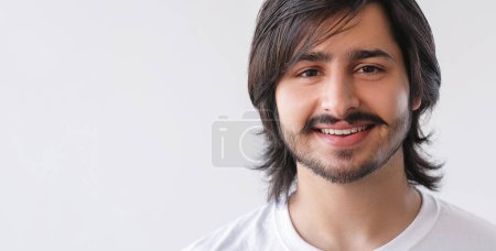 Photo for Happy face. Grooming appearance. Attractive unshaven smiling dark haired guy expressing positive emotions isolated on white copy space background. - Royalty Free Image