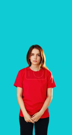 Photo for Disappointment regret. Lost opportunity. Sad upset dissatisfied woman in red T-shirt feeling despair isolated on cyan blue empty space background. - Royalty Free Image