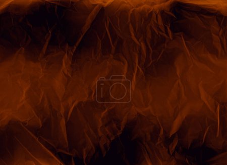 Photo for Creased paper texture. Grunge overlay. Old film effect. Orange brown black color wrinkled worn surface with dust scratches on dark illustration retro abstract background. - Royalty Free Image