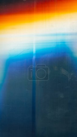 Photo for Old film overlay. Dust scratches noise. Weathered texture. Blue orange white color light flare dirt stains on dark distressed transparent screen illustration abstract background. - Royalty Free Image