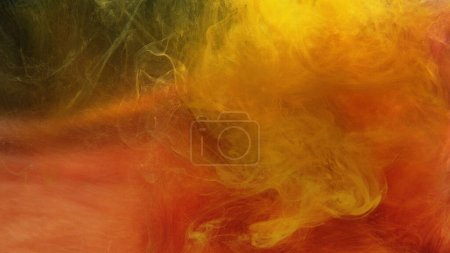 Photo for Color smoke texture. Paint water mix. Haze wave. Yellow orange red glowing vapor cloud glitter particles floating abstract art background. - Royalty Free Image