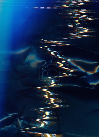 Photo for Glitch noise overlay. Creased texture. Distressed film. Blue orange color light flare defect dust scratch distortion on dark illustration abstract background. - Royalty Free Image