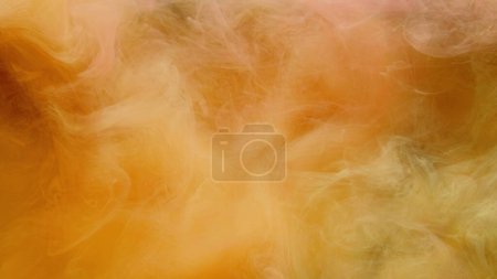 Color steam cloud. Abstract background. Ink water wave. Vapor floating. Yellow glowing smoke haze art texture with free space.