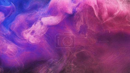 Foto de Pinta agua. Nube de humo de color. Fondo abstracto. Salpicadura submarina. Vibrante rosa azul brillante explosión vapor onda arte textura. - Imagen libre de derechos