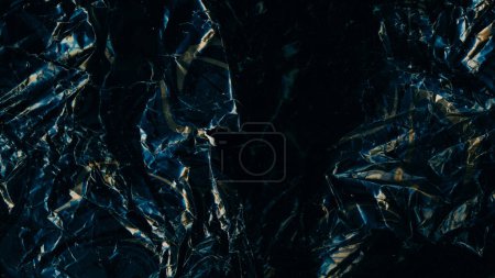 Photo for Wrinkled paper. Grunge texture. Abstract background. Crumpled black old wallpaper with yellow ornament pattern dark light shadow. - Royalty Free Image