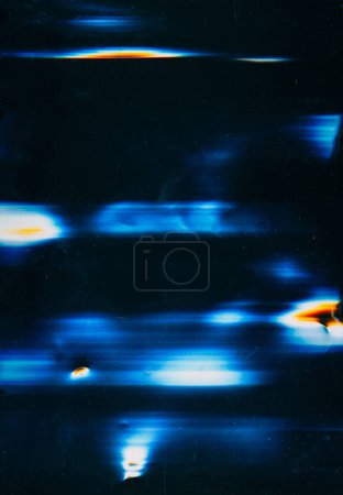 Photo for Glitch flare. Overlay background. Abstract banner. Black scratched surface with glowing blue orange distortion light spots pattern. - Royalty Free Image