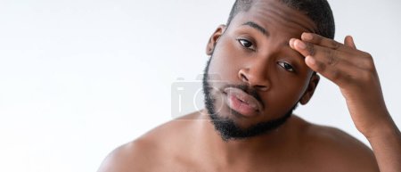 Photo for Man skincare. Morning routine. Confident handsome shirtless guy touching perfect smooth soft face skin isolated on white background empty space. - Royalty Free Image