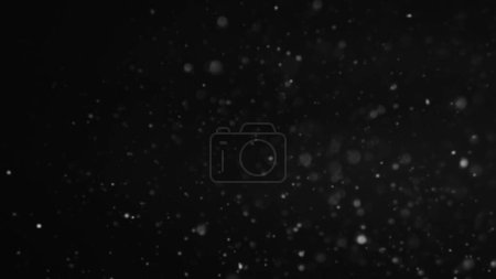 Téléchargez les photos : La nuit d'hiver. Des flocons de neige déconcentrés. Illustration abstraite de la surface brillante des chutes de neige dans le ciel noir poudreux flocons volants sur fond d'espace de copie sombre. - en image libre de droit