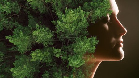 Photo for Art portrait. Nature beauty. Double exposure profile of peaceful woman face with closed eyes green forest foliage hair isolated on dark background. - Royalty Free Image