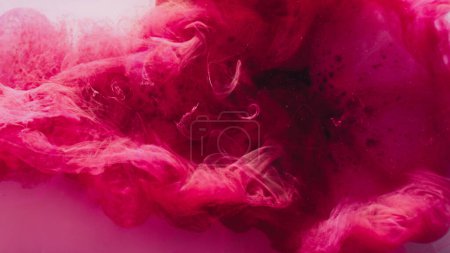 Photo for Ink splash background. Magic vapor. Magenta pink hypnotic ethereal puff fog cloud spreading captivating mysterious fantasy abstract steam art. - Royalty Free Image