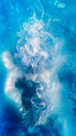 Photo for Paint splash background. Heaven cloud. Glowing blue white ethereal smoke puff flow spreading in abstract sky hypnotic shimmering glitter ink art. - Royalty Free Image