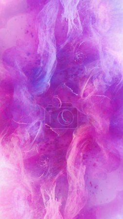 Photo for Smoke background. Ethereal aura. Pink purple liquid ink mysterious splash cloud hypnotic swirls flow light particles spreading in water wave. - Royalty Free Image