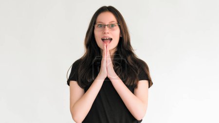 Wow surprise. Astonished face. Portrait of happy amazed impressed excited woman with open mouth isolated on white empty space background.