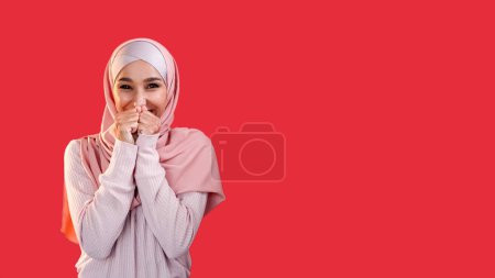 Photo for Surprise joy. Wish expectation. Success enthusiasm. Pleased excited happy woman in hijab isolated on red empty space background. - Royalty Free Image