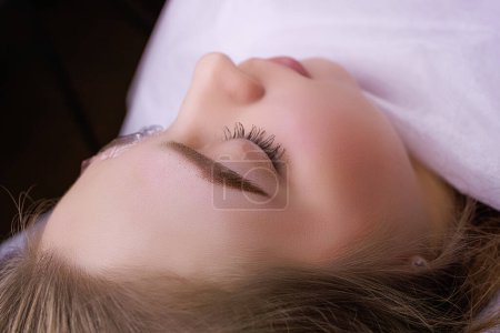 Photo for The model has permanent eyebrow makeup applied to her eyebrows. PMU Procedure, Permanent Eyebrow Makeup. - Royalty Free Image