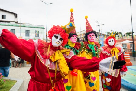 Maragogipe, Bahia, Brazil - February 20, 2023: Costumed people are playing during the carnival in the city of Maragogipe. Bahia Brazil.