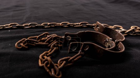 Photo for Old chains or handcuffs used to hold prisoners or slaves between 1600 and 1800. - Royalty Free Image
