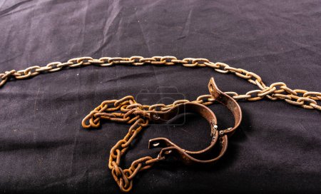 Photo for Old chains or handcuffs used to hold prisoners or slaves between 1600 and 1800. - Royalty Free Image