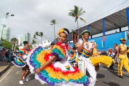 Salvador, Bahia, Brazil - February 11, 2023: Cultural group of Forro dressed in character parade in Fuzue, pre-Carnival in Salvador, Bahia, Brazil.