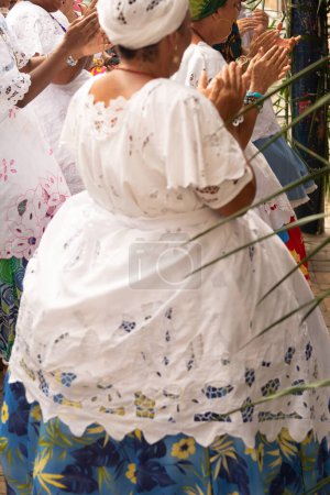 Photo for Saubara, Bahia, Brazil - June 12, 2022: Members of Candomble participate in dancing during festivals for Santo Antonio in the district of Bom Jesus dos Pobres, city of Saubara, Bahia. - Royalty Free Image