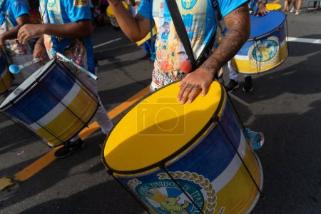 Salvador, Bahia, Brazil - February 03, 2024: Members of cultural percussion groups are seen playing during Fuzue, pre-carnival in the city of Salvador, Bahia.