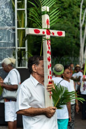 Photo for Salvador, Bahia, Brazil - April 14, 2019: People are seen participating in the Palm Sunday celebration in the city of Salvador, Bahia. - Royalty Free Image
