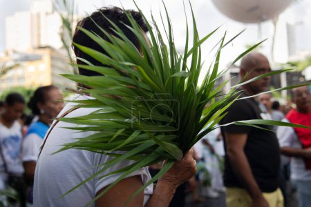 Photo for Salvador, Bahia, Brazil - April 14, 2019: People are seen participating in the Palm Sunday celebration in the city of Salvador, Bahia. - Royalty Free Image