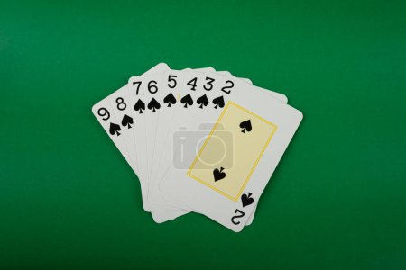 Photo for Playing cards isolated on green background. Gambling. - Royalty Free Image