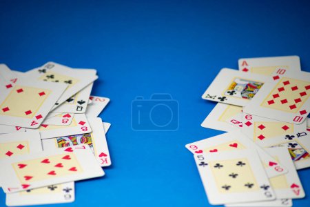 Photo for Playing cards isolated on blue background. Gambling. - Royalty Free Image
