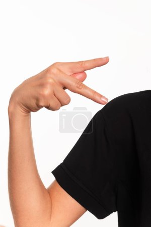 Close-up of a hand making the letter P in Brazilian sign language for the deaf, Libras. Isolated on white background.